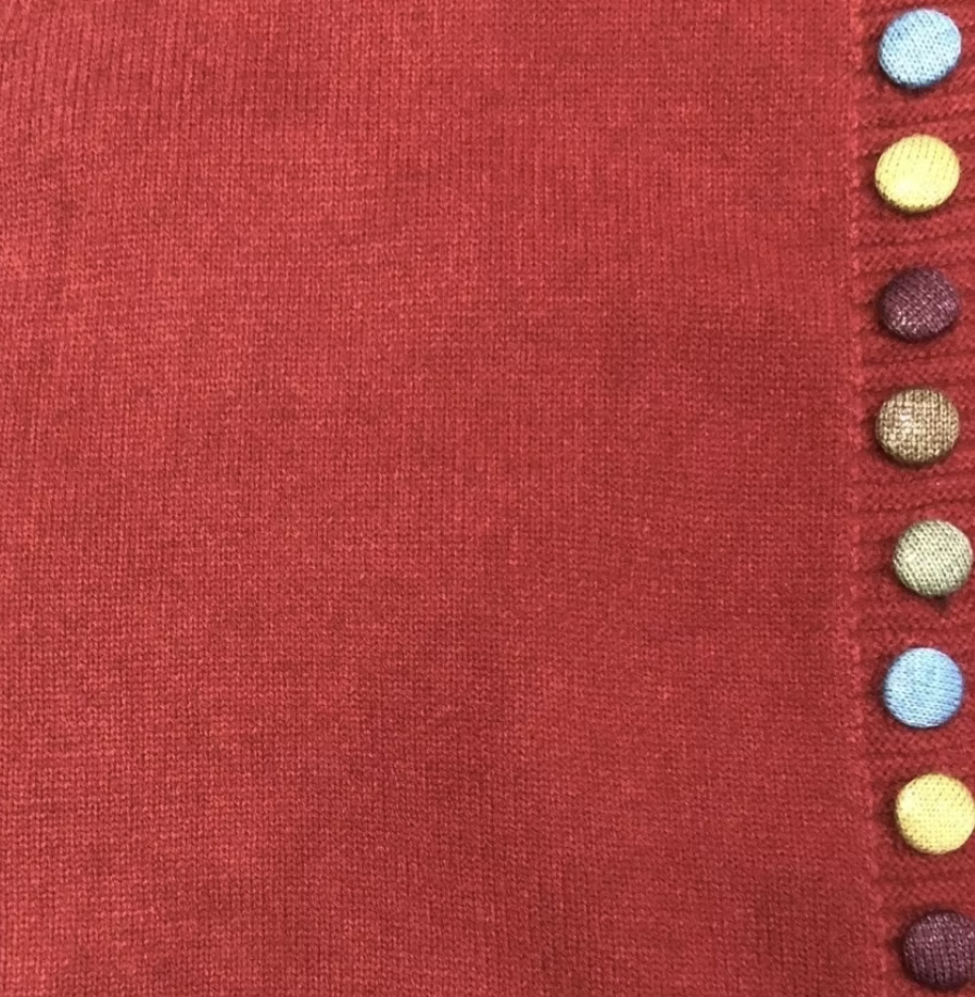 Maribel | Mouwloze cardigan met speelse knoopdetails