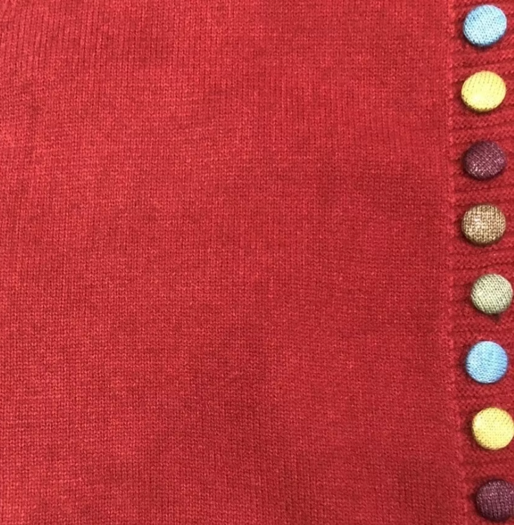 Maribel | Mouwloze cardigan met speelse knoopdetails